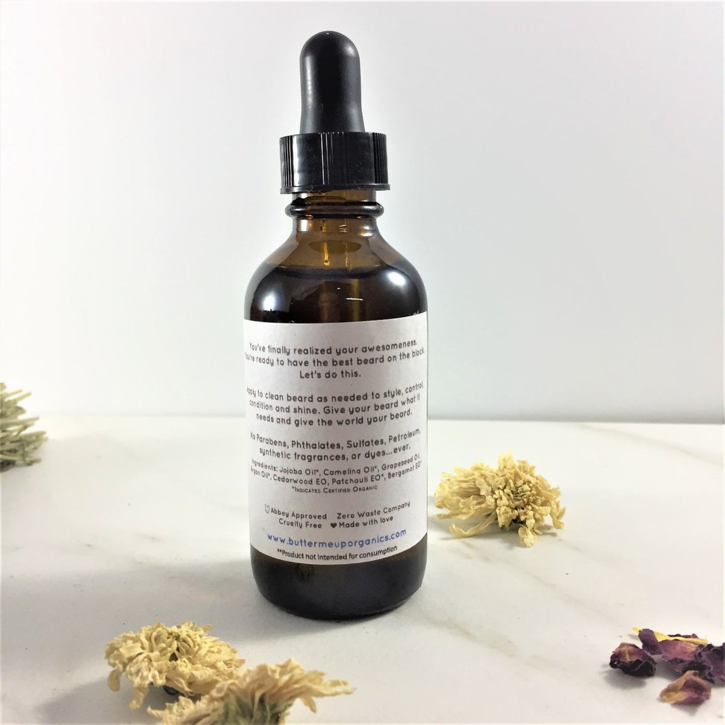 Back of bottle "wel've finally relaized your awesomeness. Are you ready to have the best beard on the block. let's do this. clean beard ass needed to style, and shine. give your beat what it needs and give the world your beard." best beard on the block organic beard oil on a shelf Made with organic oils of Argan and Jojoba combined with super conditioning Camelina oil