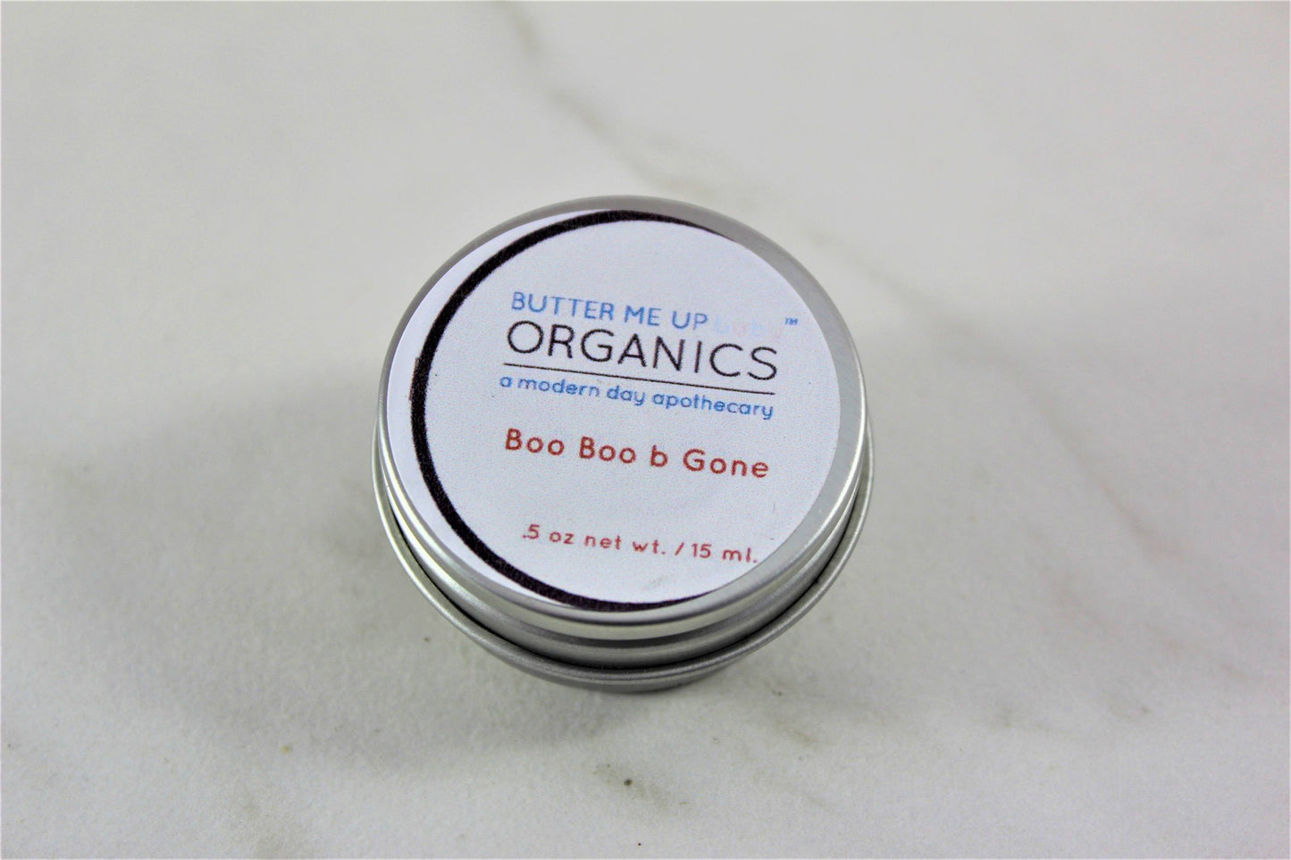 Boo Boo B Gone Butter Me uP Organic a modern day apothecary .5 oz balm closed