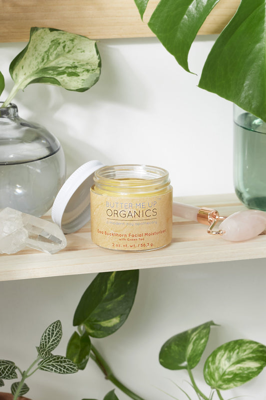 Organic Sea Buckthorn Facial Moisturizer 2 oz open jar on shelf