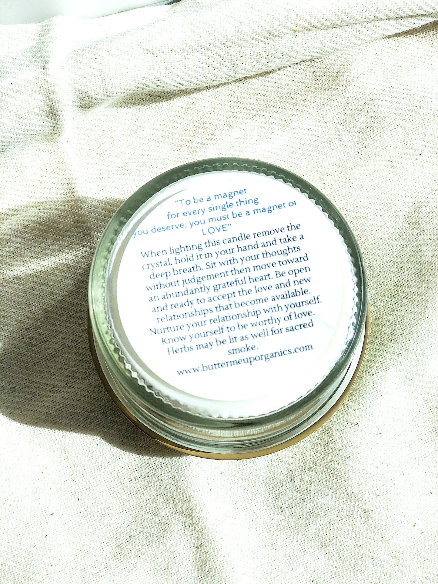 love spell intention candle is 4 oz of hand-poured soy wax in a glass jar with a metal lid closed "to be a magnet for every single thing you deserve you must be a magnet to LOVE" when lighting this candle remove the crystal, hold it in your hand and take a deep breath. sit with your thoughts without judement the move forward abundantly grateful heart. be open and ready to accept the love and new relationships that become available. nurture your relationship with yourself.